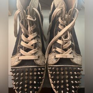 Christian Louboutin Louis Spikes high-top sneakers.